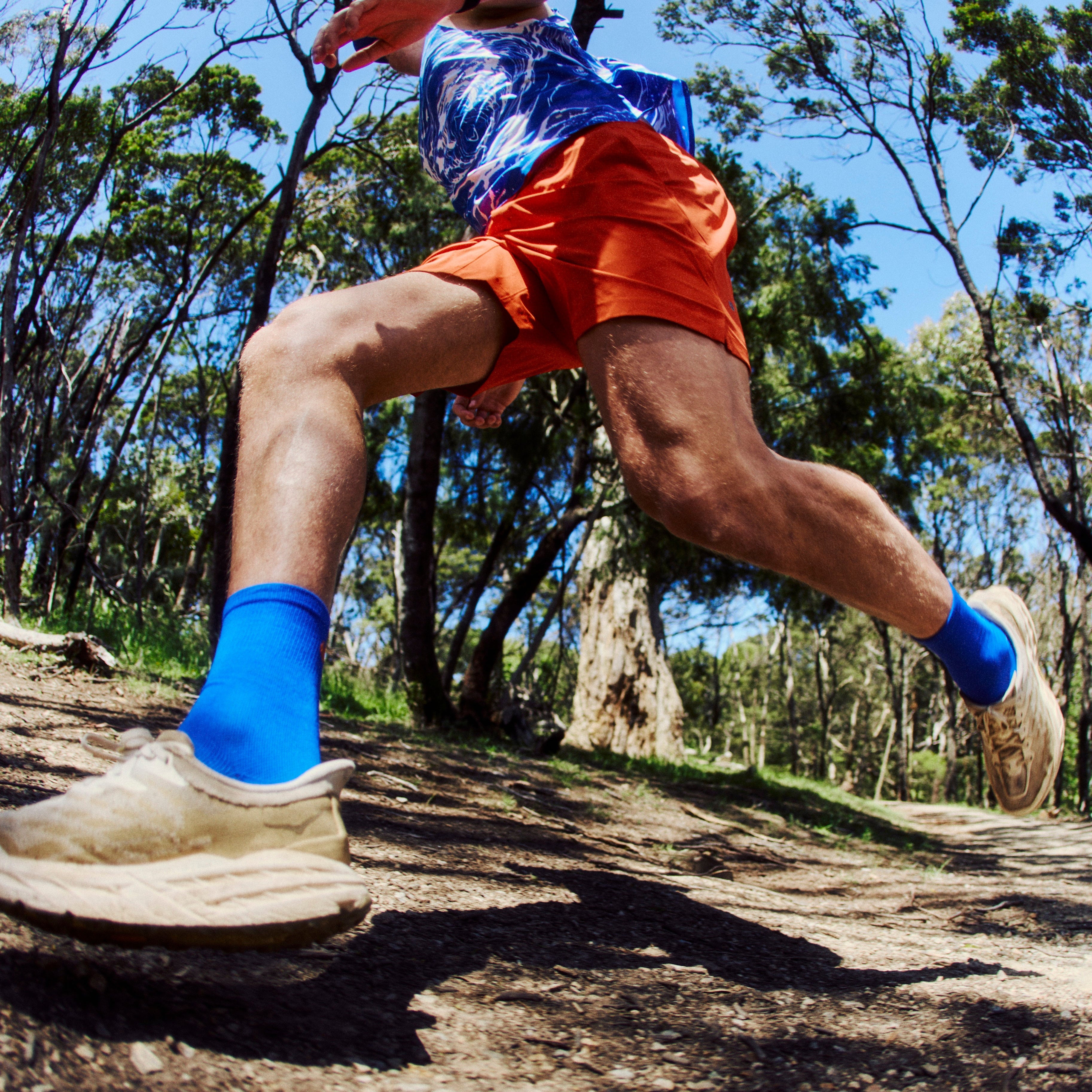 Unisex Blue Performance Running Socks on Model