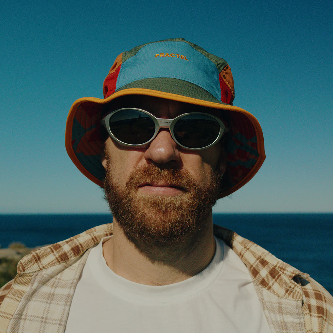 Runner wearing the Fractel B-ORBIT Bucket Hat