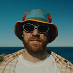 Runner wearing the Fractel B-ORBIT Bucket Hat