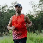 Runner wearing CP-ALLOY Running Cap outdoors