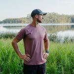 Runner wearing CP-ALLOY Running Cap outdoors