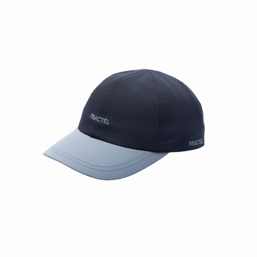 Two-tone navy and light blue cap with Fractel branding on a white background