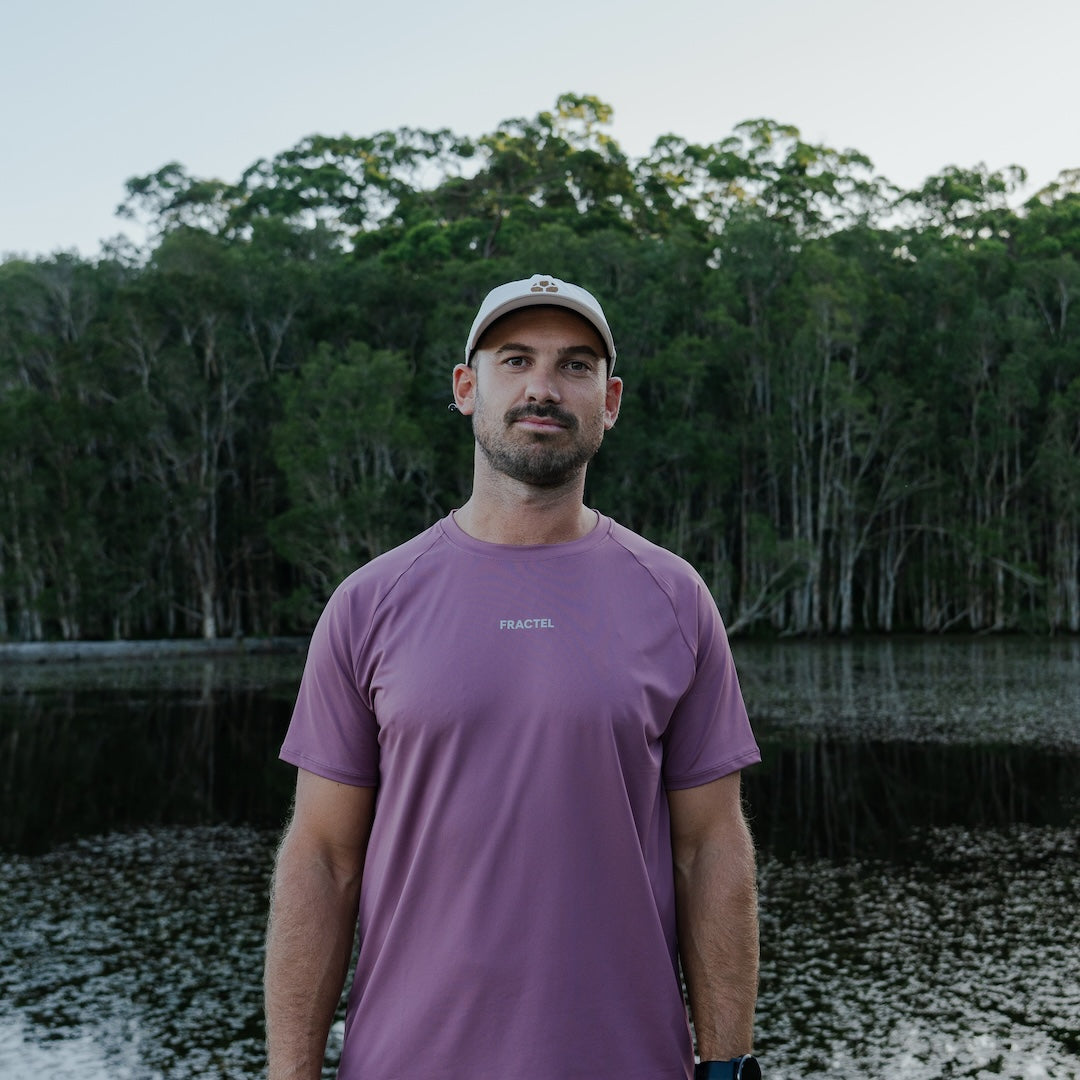Runner wearing CP-SHORELINE Running Cap outdoors