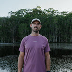 Runner wearing CP-SHORELINE Running Cap outdoors