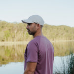 Runner wearing CP-SHORELINE Running Cap outdoors