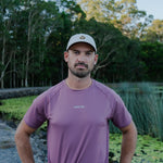 Runner wearing CP-SHORELINE Running Cap outdoors
