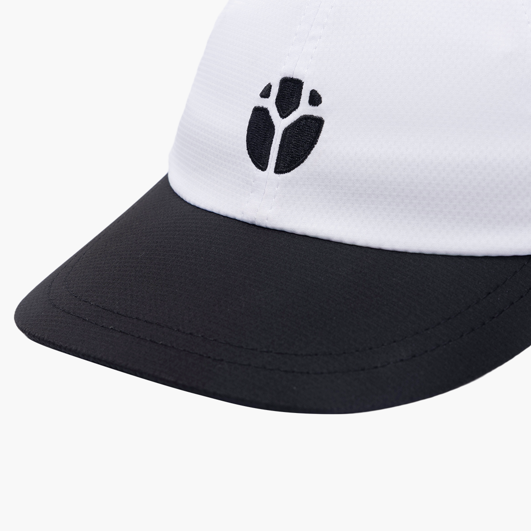 Close-up of FRACTEL logo on CP-THRESHOLD Running Cap