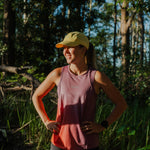 Runner wearing E-ALBA Cap outdoors