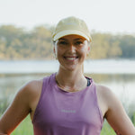 Runner wearing E-ALBA Cap outdoors