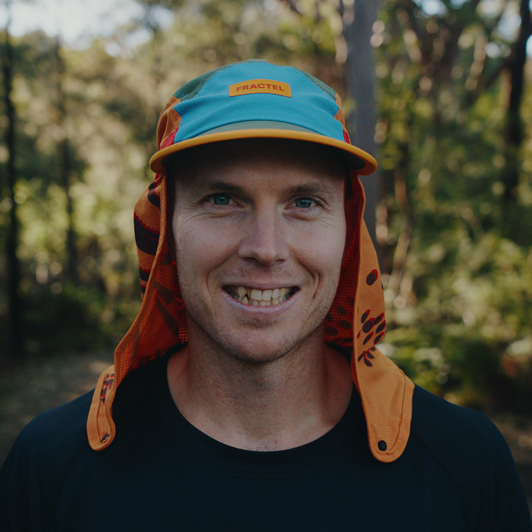 Runner wearing the Fractel L-ORBIT Legionnaire Hat