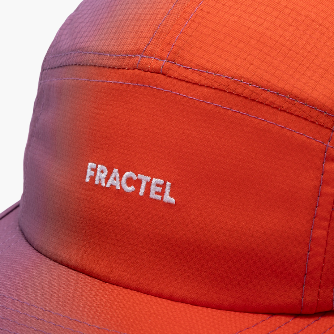 Close-up of M-EMBER Running Cap front panel