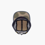 Back view of a cap with mesh design on a white background