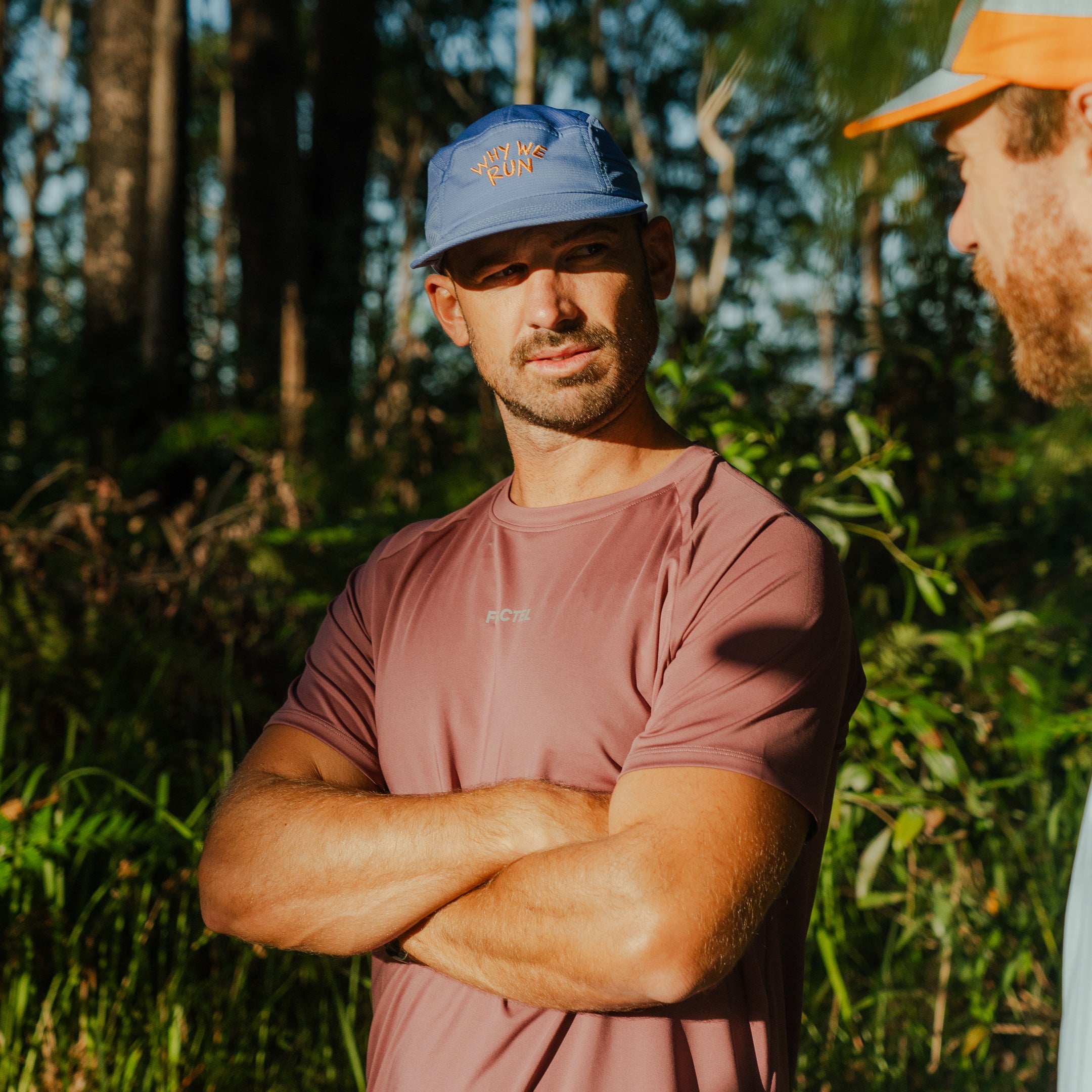 Runner wearing Men's S-AURA Running Shirt outdoors