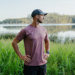 Runner wearing Men's S-AURA Running Shirt outdoors