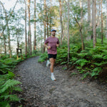 Runner wearing Men's S-AURA Running Shirt outdoors