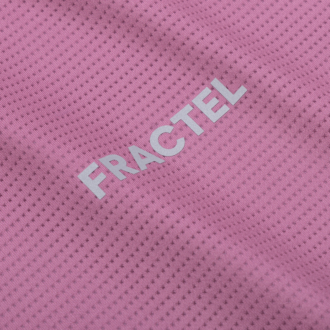 Close-up of FRACTEL logo on Women's S-EMBER Running Singlet